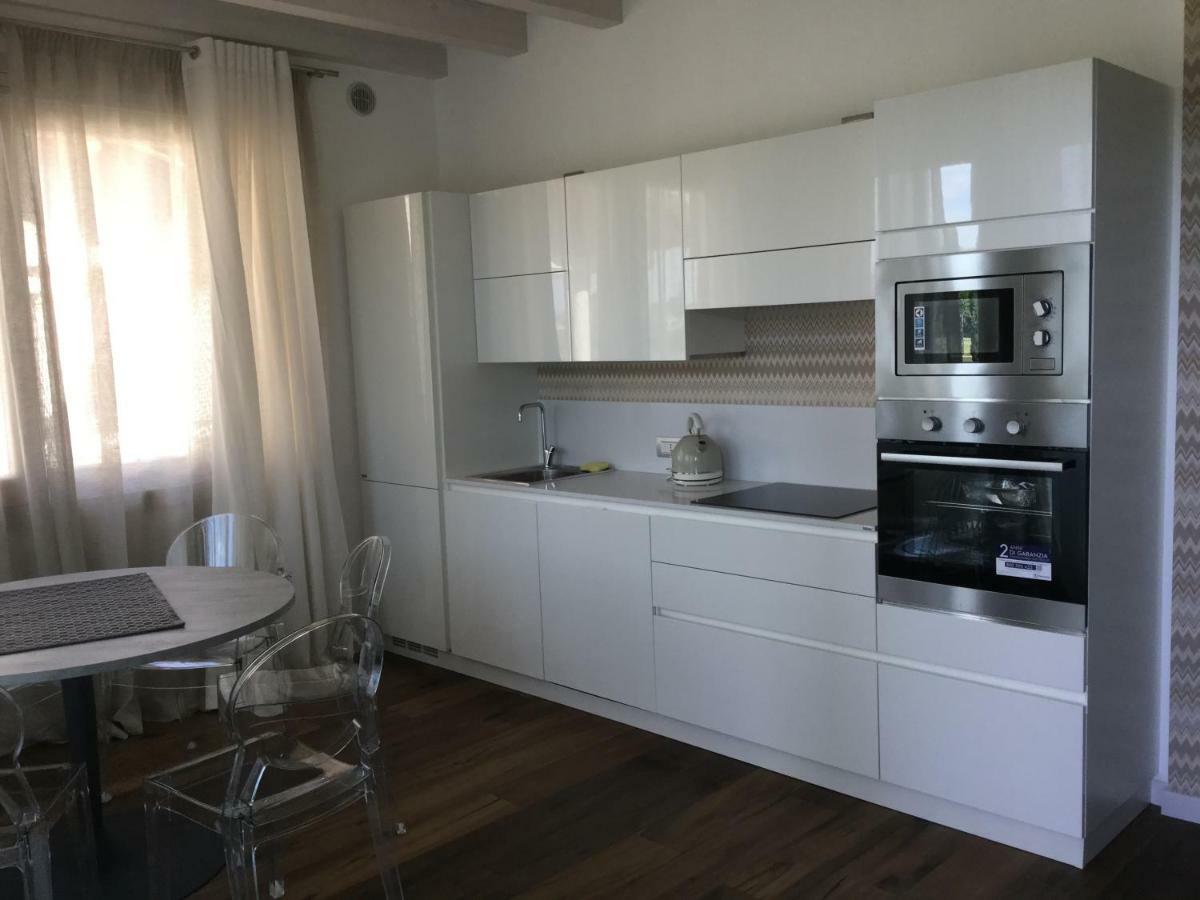 Bellavita Appartments Сирмионе Экстерьер фото